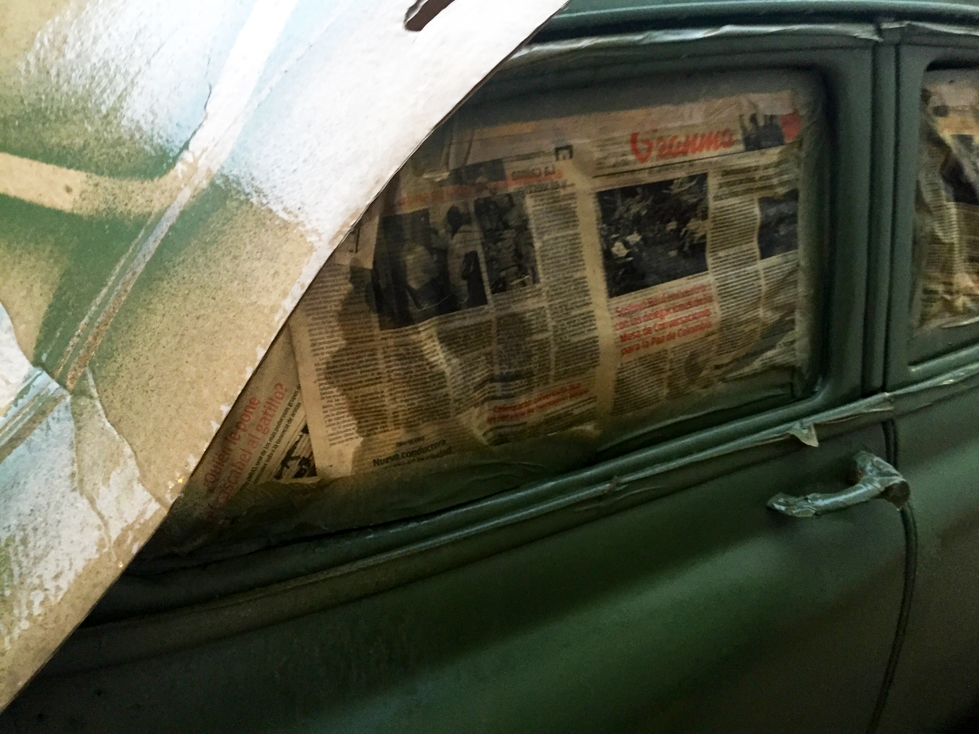 Newspapers blocking a car's windows