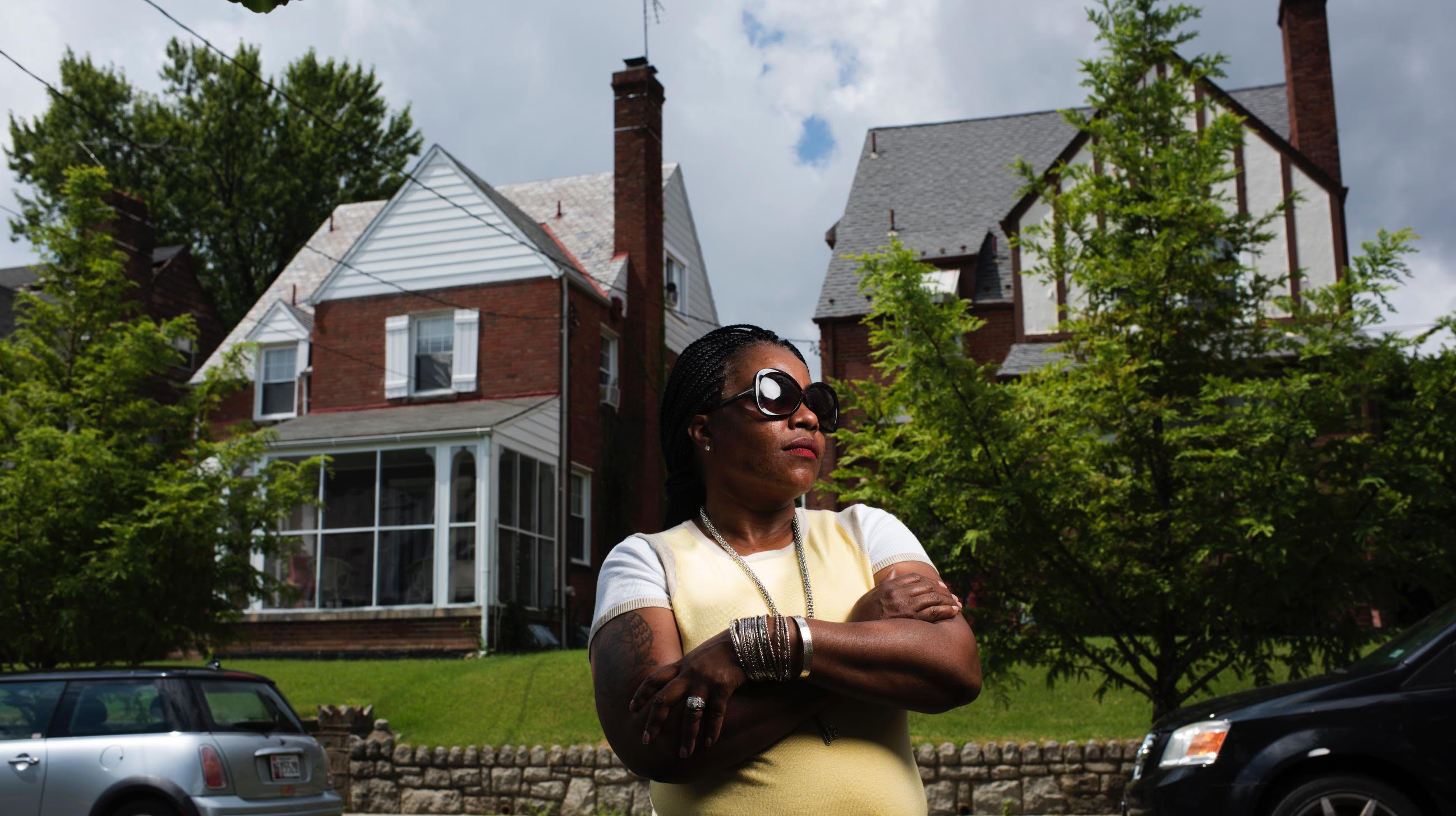 Rajuawn Middleton stands outside the house where she was forced her to leave in Washington, D.C. on August 21, 2016